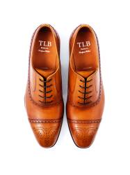 Jasno brązowe Eleganckie obuwie z ażurkami i dekoracyjnymi zdobieniami typu brogues. Szyte metodą  goodyear welted. TLB 537 old england cuero.