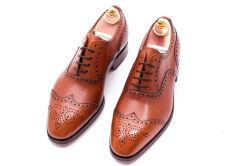 Yanko 14780 cambridge cuero. Eleganckie obuwie z ażurkami i dekoracyjnymi zdobieniami koloru jasno brązowego typu brogues z skórzaną podeszwą. Szyte metodą ramową.