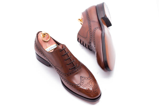 Brązowe biznesowe eleganckie stylowe buty klasyczne TLB 531 old england marron typu brogues na skórzanej podeszwie.
