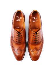 Jasno brązowe Eleganckie obuwie z ażurkami i dekoracyjnymi zdobieniami typu brogues. Szyte metodą  goodyear welted. TLB 531s old england cuero.