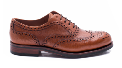 Eleganckie obuwie koloru jasno brązowego typu brogues z gumową podeszwą. Szyte metodą ramową.