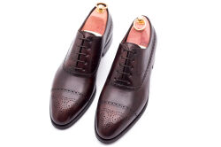 TLB 542c museum brown 01..Eleganckie obuwie skórzane z ażurkami i dekoracyjnymi zdobieniami koloru brązowego typu brogues na gumowej podeszwie. Szyte metodą goodyear welted.