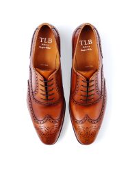 TLB 527 Vegano cuero Eleganckie obuwie koloru jasno brązowego typu brogues z skórzaną podeszwą. Szyte metodą ramową.