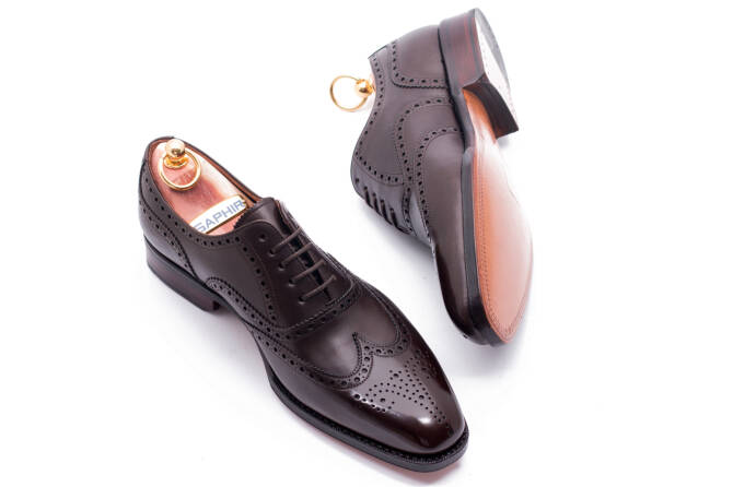 stylowe eleganckie obuwie męskie z perforacjami Yanko 545 boxcalf marron.. Eleganckie obuwie koloru brązowego typu brogues z skórzaną podeszwą. Szyte metodą ramową.